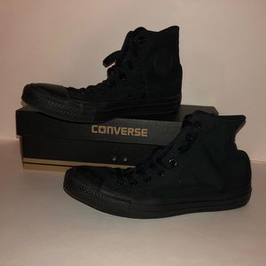 All black Converse high tops